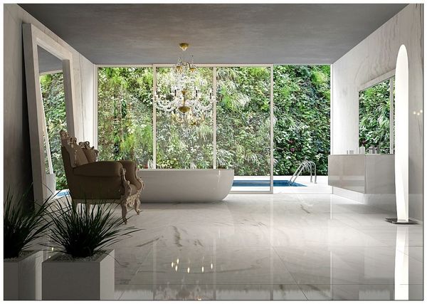 Оригинальная ванная комната в светлых тонах: белоснежный пол и стены, сделанные из натурального камня и радующие своих хозяев изысканным блеском, окна до пола, наполняющие комнату светом ипростором, джакузи.Удачное соединение стиля и удобства.