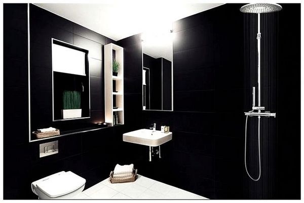 Минималистическая ванная с черно-белой плиткой.